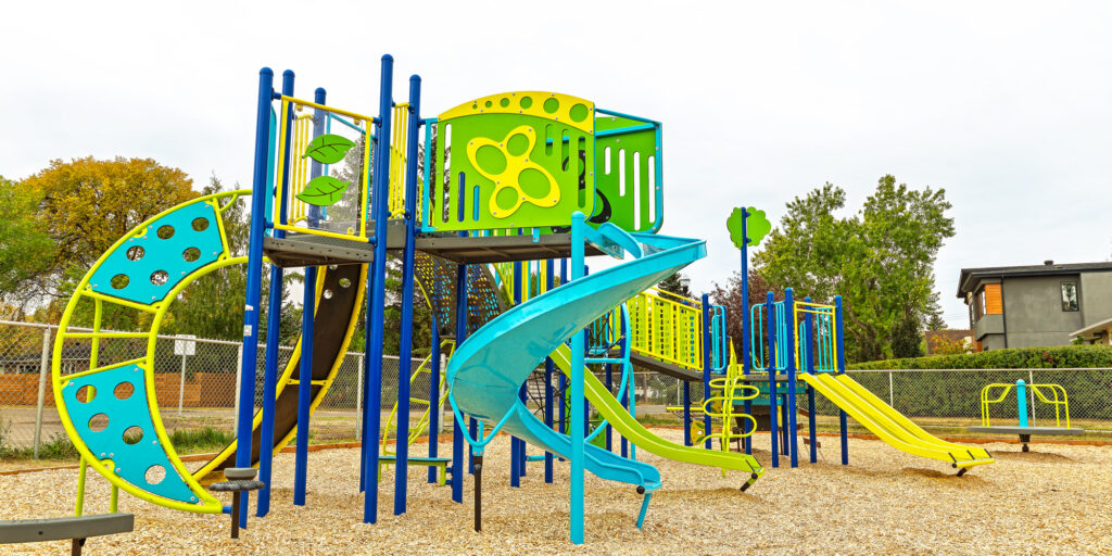Newly installed playground featuring swings and play equipment